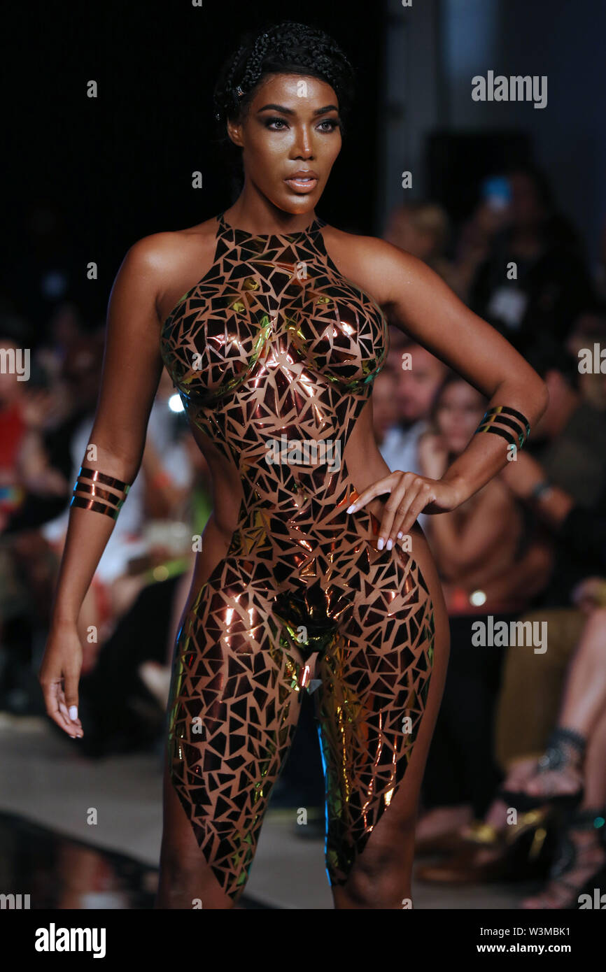 MIAMI BEACH, FLORIDA - JULY 15: A model walks the runway for BLACK TAPE  PROJECT At Miami Swim Week Powered By Art Hearts Fashion Swim/Resort  2019/20 at Faena Forum on July 15,