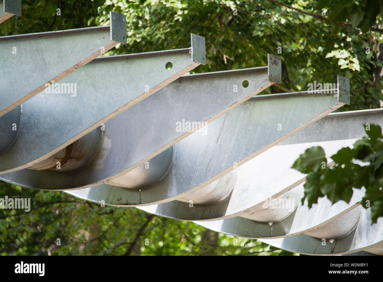 Support Rods Bridge Closeup of metal supports for the construction of a hanging bridge or ...