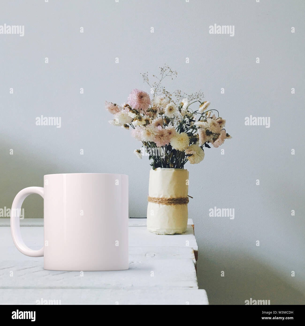 White Mug Mockup. Perfect for businesses selling mugs, just overlay your quote or design on to the image. Stock Photo
