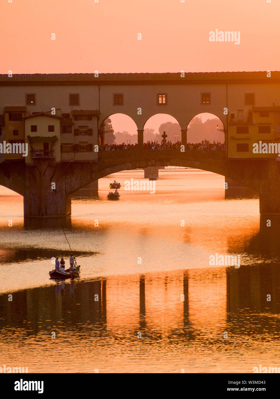 Italy, Tuscany, the city of Florence. The Ponte Vecchio brdige at sunset. Stock Photo