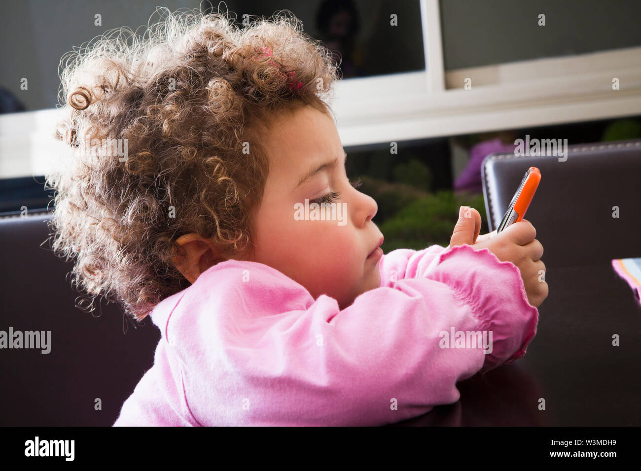 Girls brown curly hair hi-res stock photography and images - Alamy