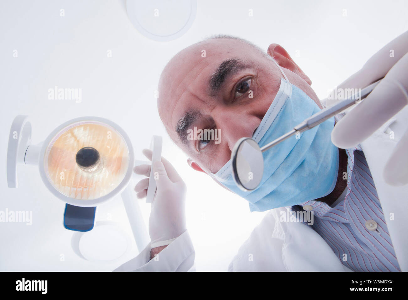 View directly below dentist during examination Stock Photo