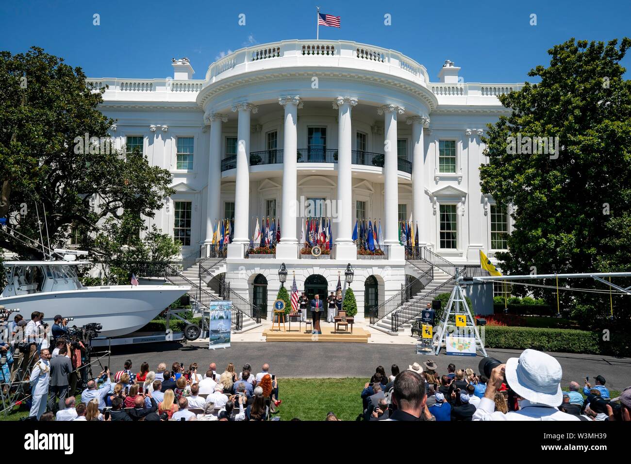 U.S President Donald Trump delivers remarks during the Made in America Product Showcase on the South Lawn of the White House July 15, 2019 in Washington, DC. Stock Photo