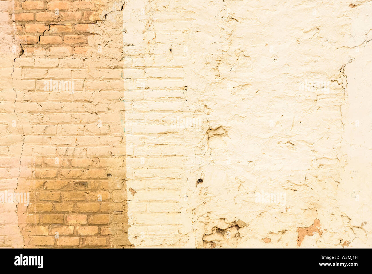 Texture of a brick wall painted in orange tones, ideal for background ...