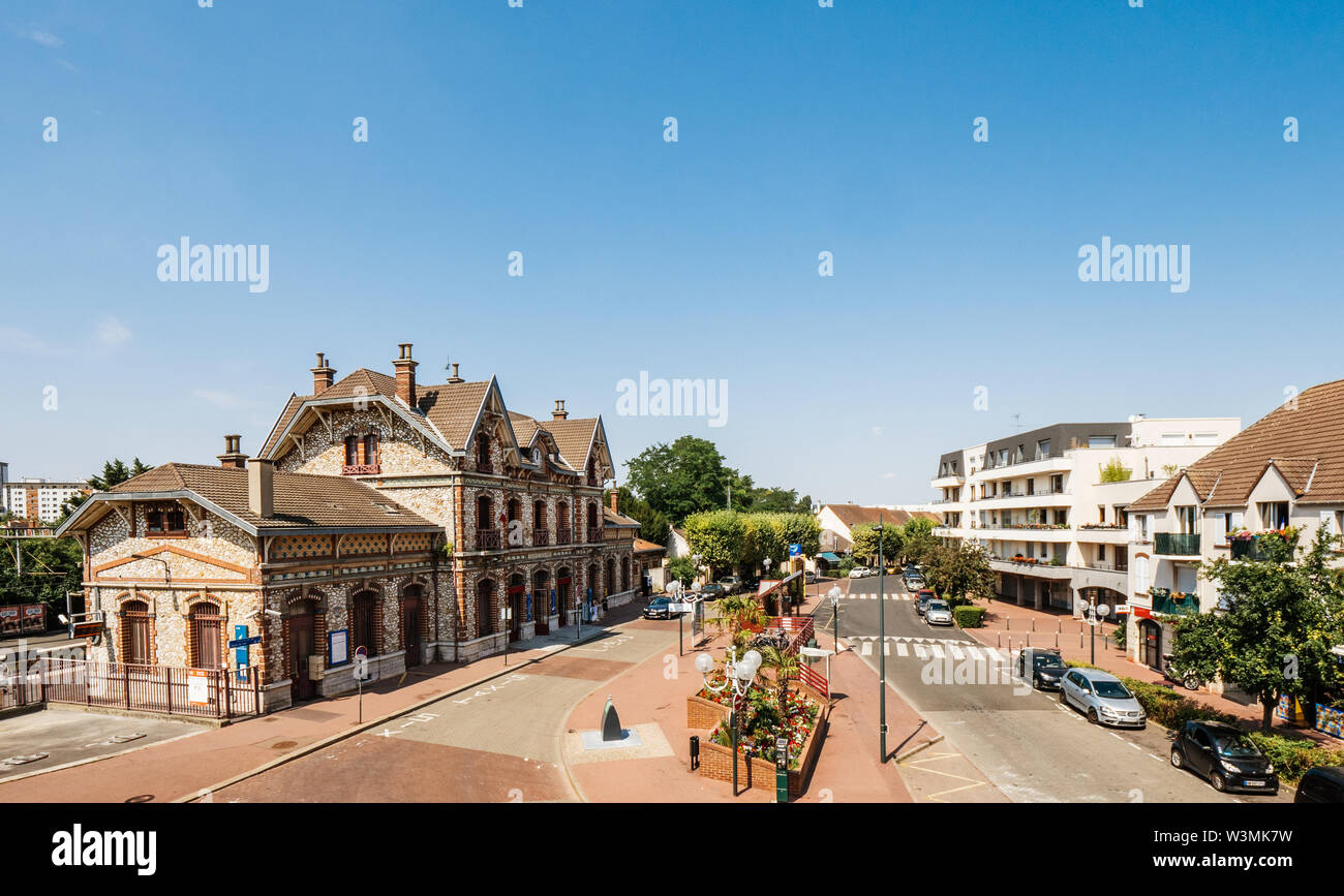 Saint-Gratien, France - Jul 15, 2018: View from above of main square of Saint Gratien with central Train Station. Saint-Gratien is a commune in the northern suburbs of Paris Stock Photo