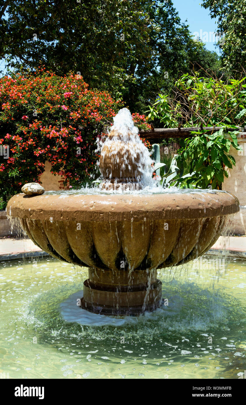 Beautiful, large Spanishstyle fountain with falling, splashing water