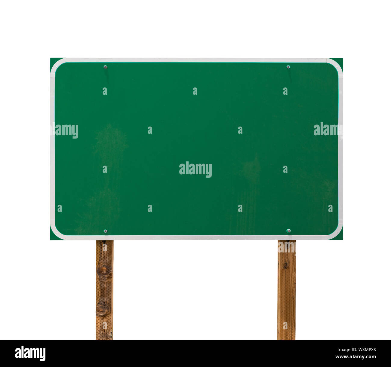 Blank Green Road Sign with Wooden Posts Isolated on a White Background. Stock Photo