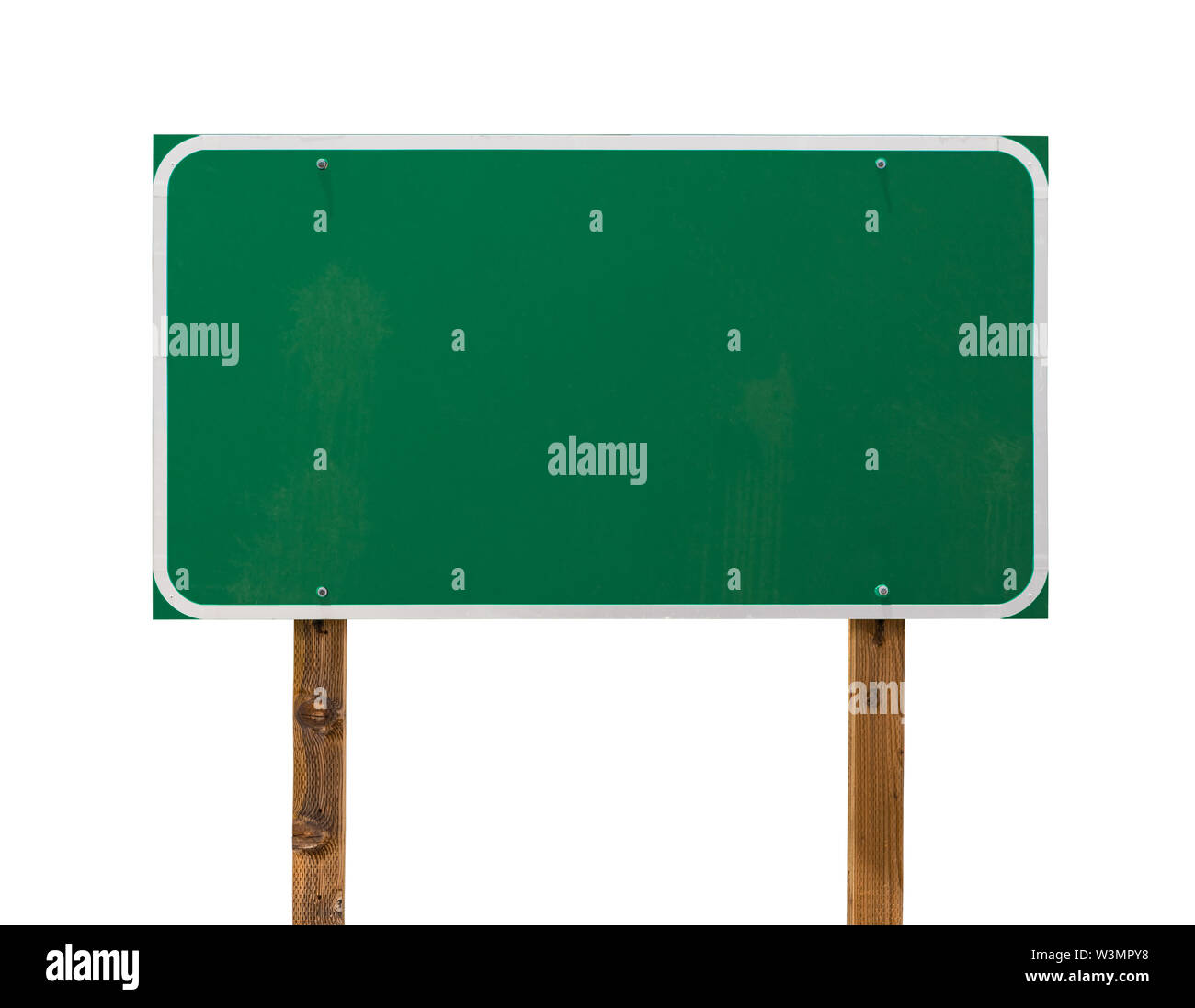 Blank Green Road Sign with Wooden Posts Isolated on a White Background. Stock Photo
