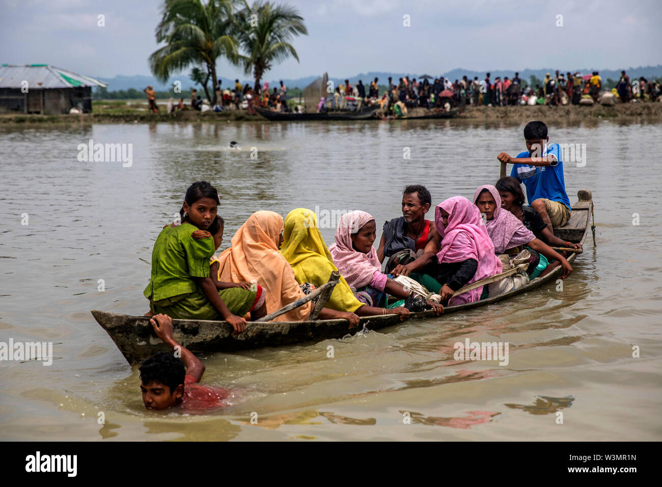 Over the past few days, more than 300,000 Rohingya Muslims have fled Burma’s Rakhine state for Bangladesh, climbing over hills and boarding boats to safety. Stock Photo