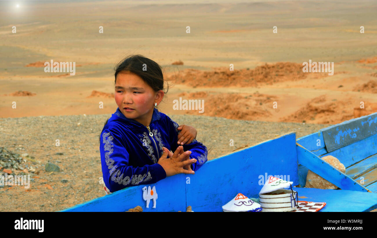 Mongolian girl in Flaming Cliffs, Gobi desert, Mongolia Stock Photo