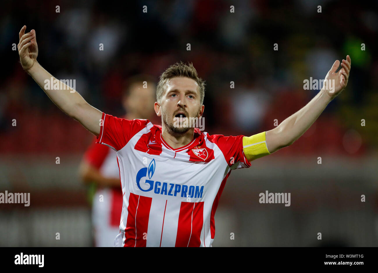 Belgrade. 18th Aug, 2020. Crvena Zvezda's El Fardou Ben Nabouhane (L)  celebrates goal with teammates during UEFA Champions League first  qualifying round football match between Crvena Zvezda and Europa FC in  Belgrade