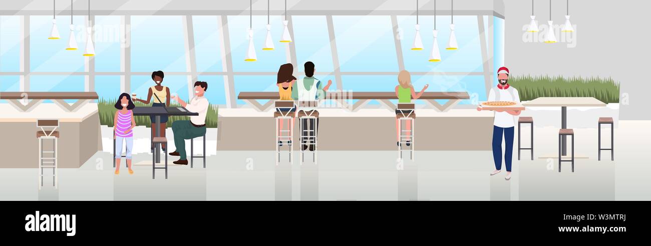 Mix Race People Sitting Cafe Table Spending Time At Restaurant