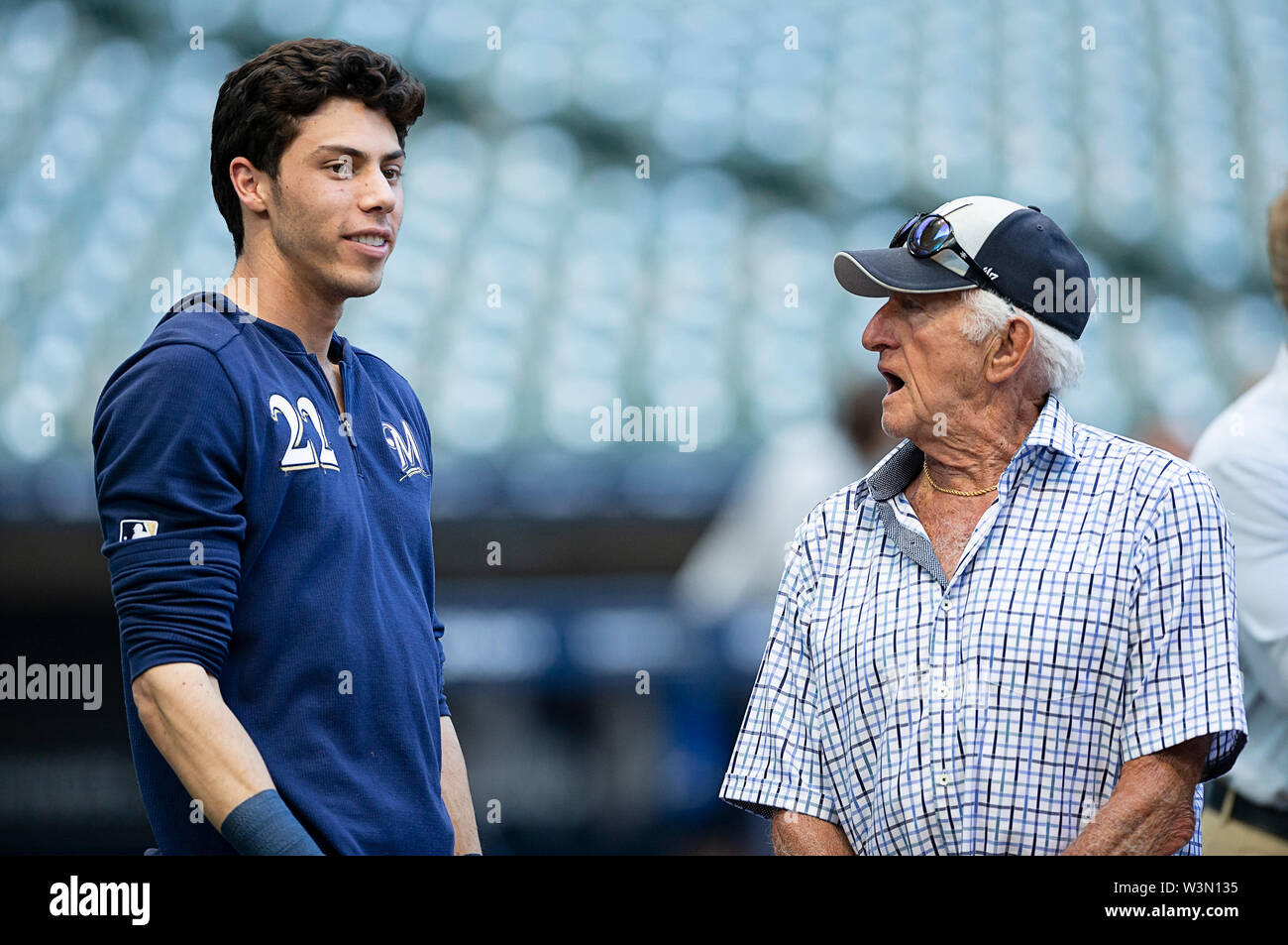 Milwaukee, WI, USA. 16th July, 2019. Bob Uecker talks with Milwaukee  Brewers right fielder Christian Yelich #22 before the Major League Baseball  game between the Milwaukee Brewers and the Atlanta Braves at