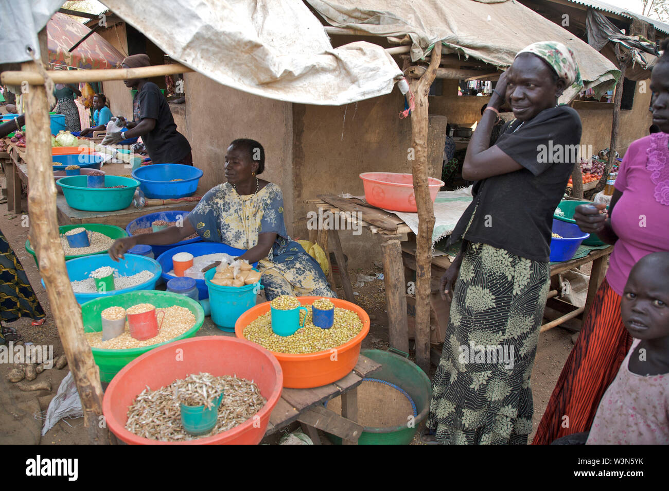 A woman sells grocery at a market, in Juba, the capital of South Sudan