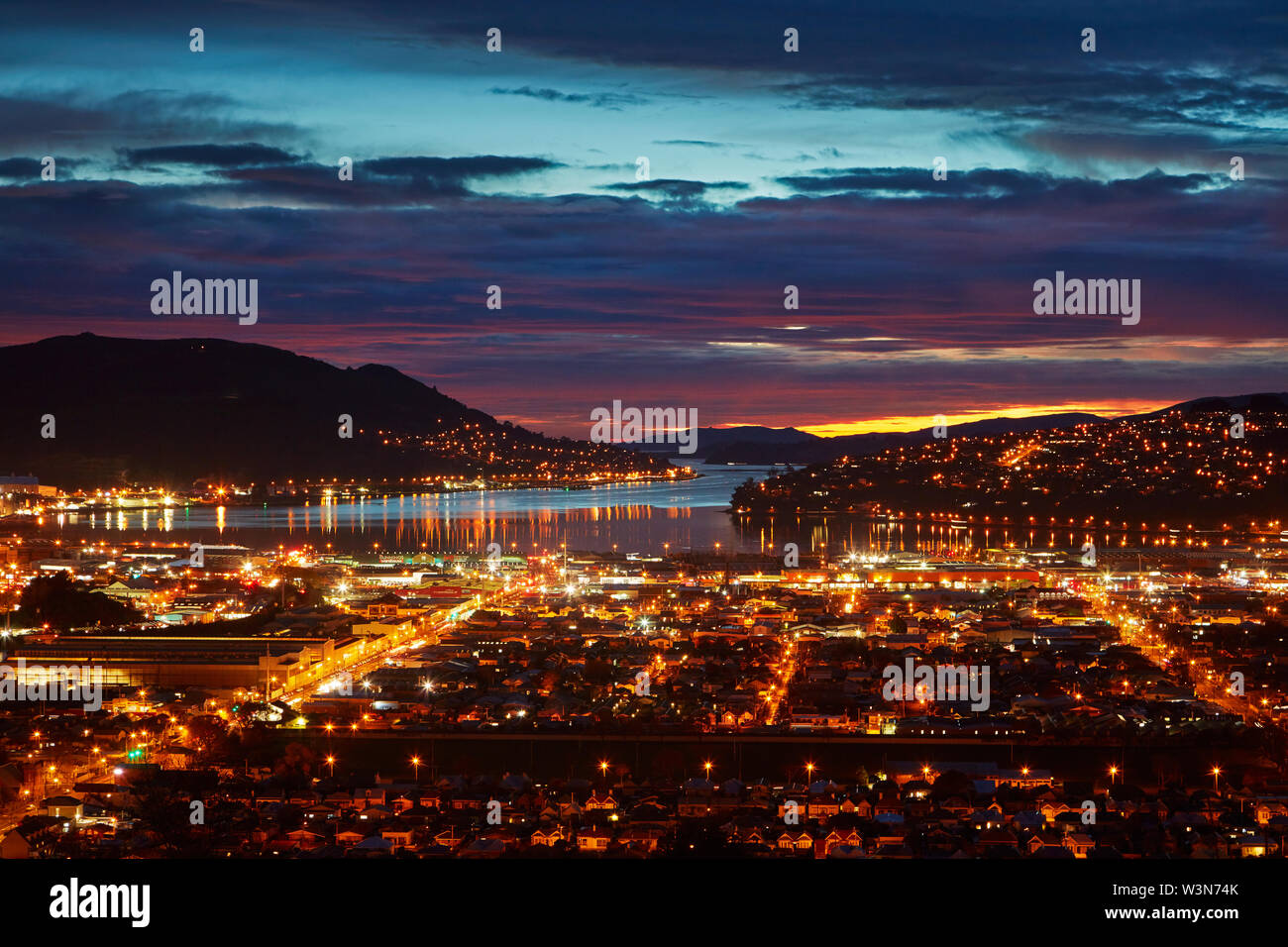 City lights, South Dunedin and Otago Harbour, Dunedin, South Island, New Zealand Stock Photo Alamy
