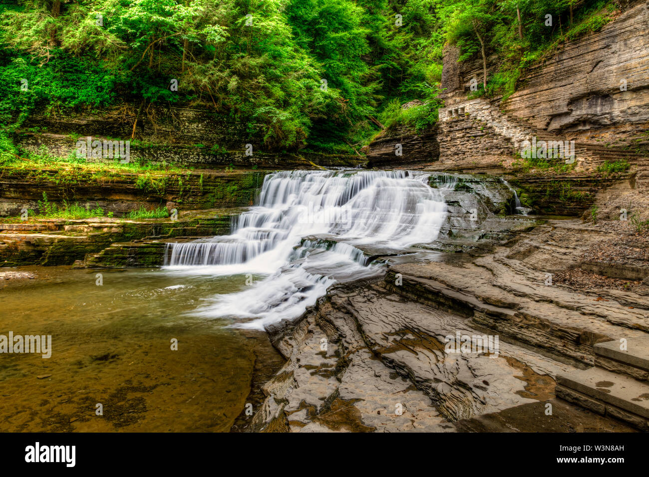 Small Cascading Waterfall in Upper Robert H Treman State Park Stock Photo