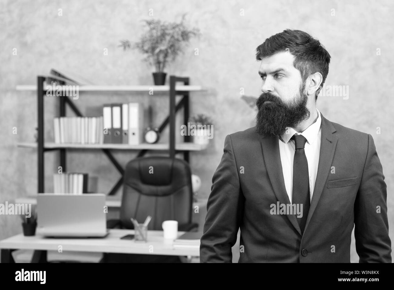 Man bearded serious office background. Provide consultation to management on strategic staffing plans. Office staff. HR director. HR management. HR job description. Head of human resources department. Stock Photo