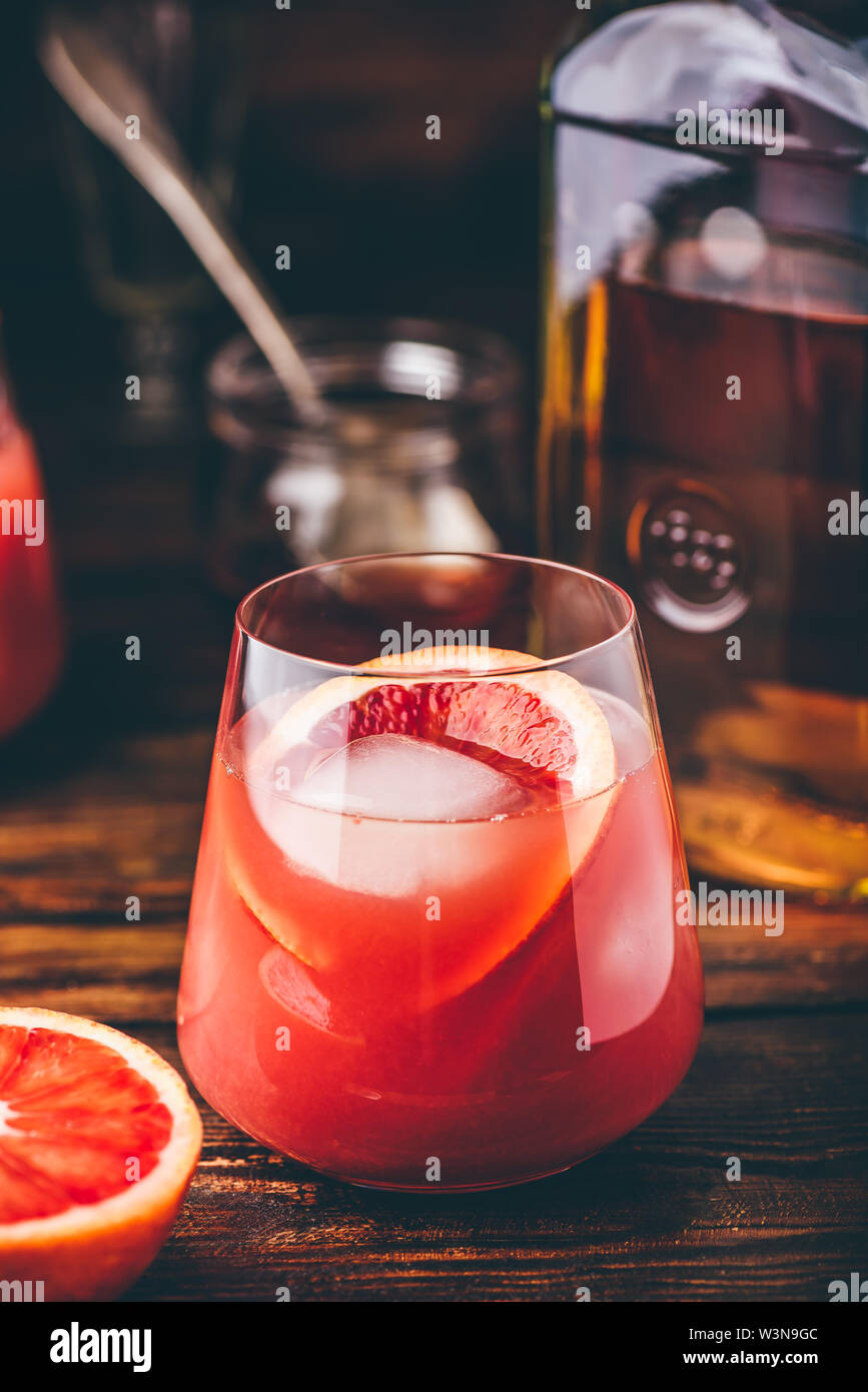 Whiskey sour cocktail with aged bourbon, blood orange juice and simple syrup Stock Photo Alamy