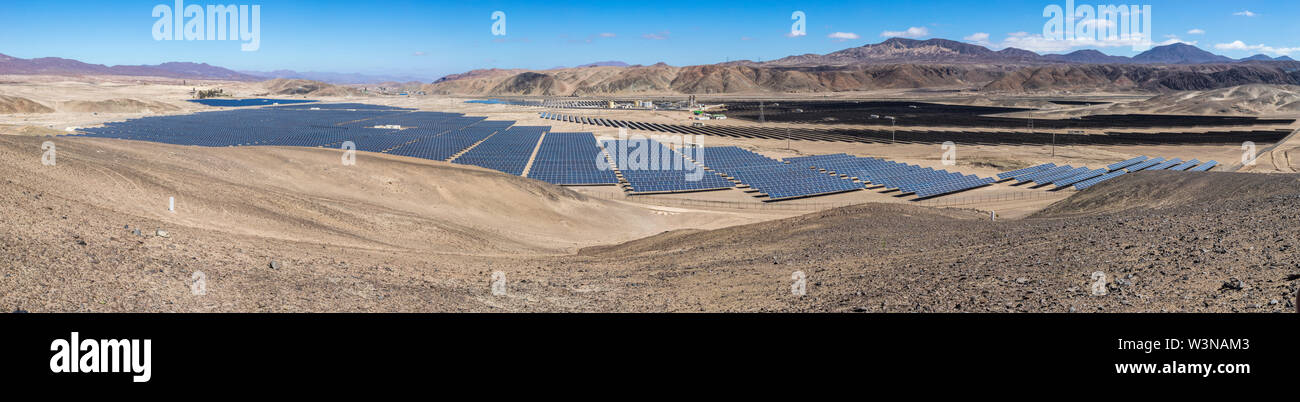 Solar Energy Photovoltaic Power Plant over Atacama desert sands, Chile. Sustainability and green energy from the sun with Solar Energy in the desert Stock Photo