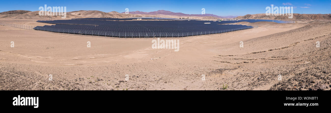 Solar Energy Photovoltaic Power Plant over Atacama desert sands, Chile. Sustainability and green energy from the sun with Solar Energy in the desert Stock Photo