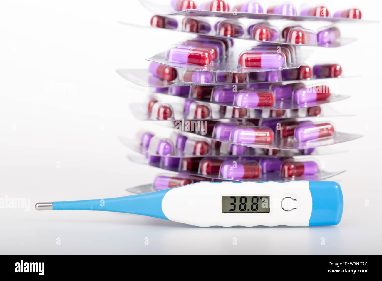 thermometer with drug on white Stock Photo Alamy