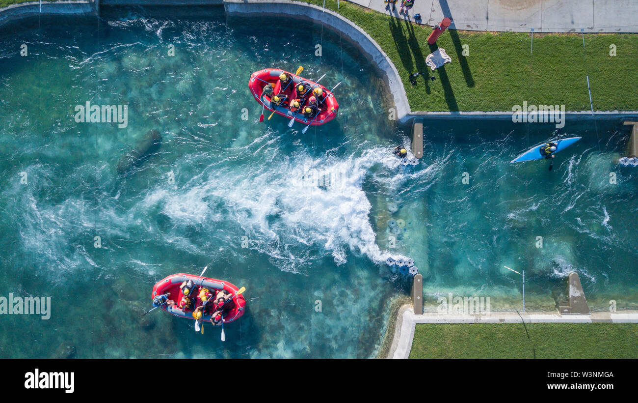 Aerial Top view of 2 rafting boats fighting against Raging River Stock Photo