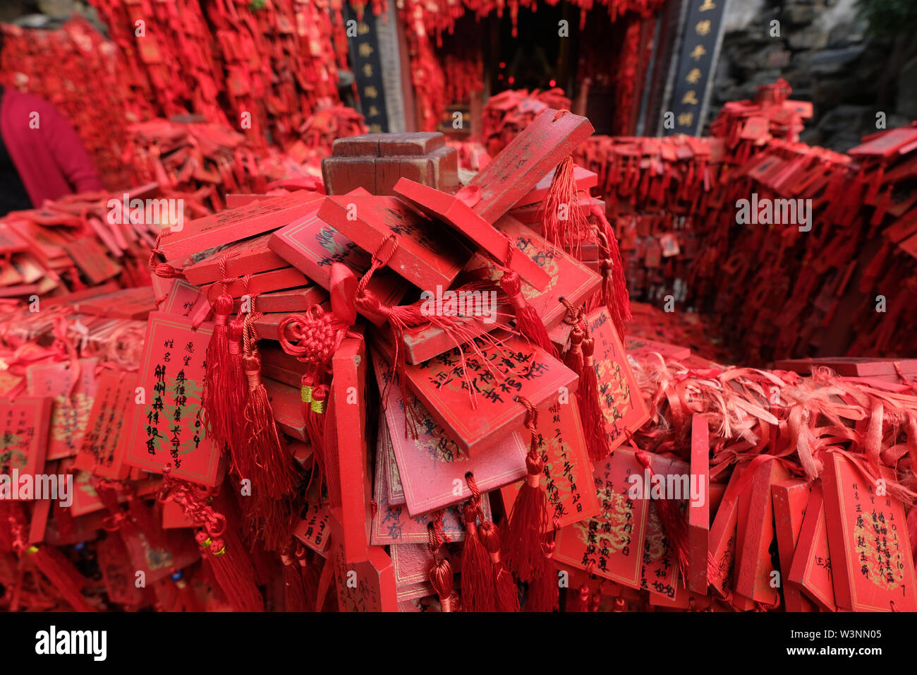 Close up on a bunch of red tags with blessing words on them in Chinese Stock Photo
