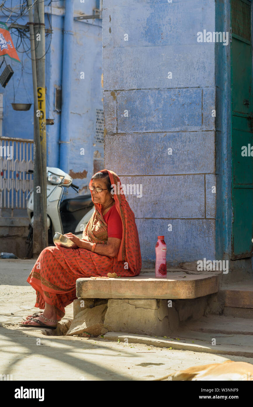 Buy Shot of an old lady sitting on street Pictures, Images, Photos By India  Today - Others pictures