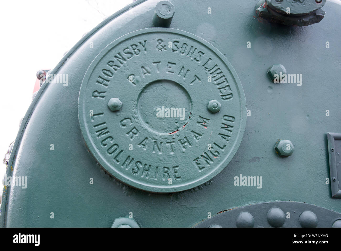 Close up of name plate on a Ruston Hornsby Portable Steam Engine. Stock Photo