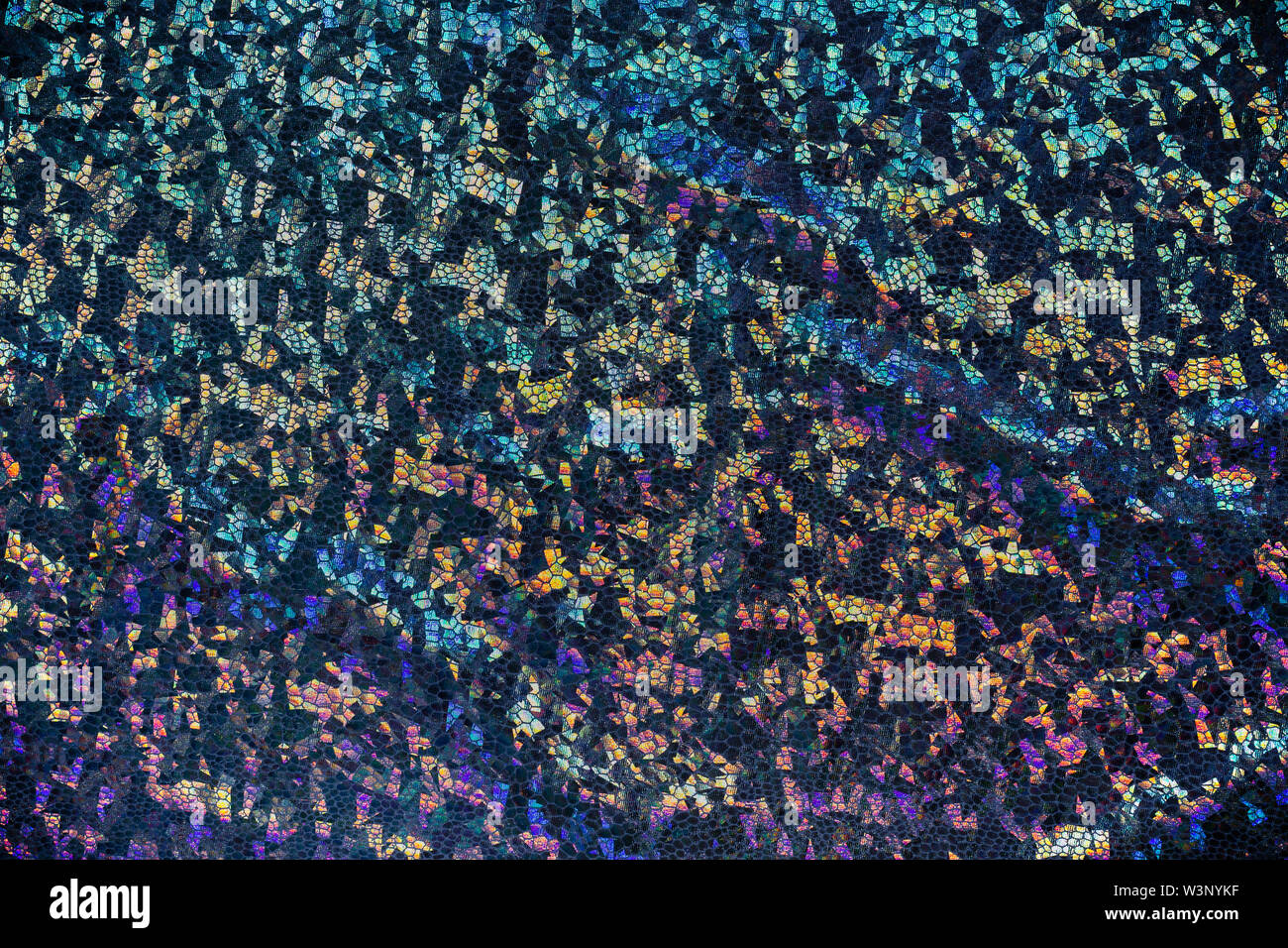 Dark fabric with folds and holographic elements. Abstract geometric background or texture. Stock Photo