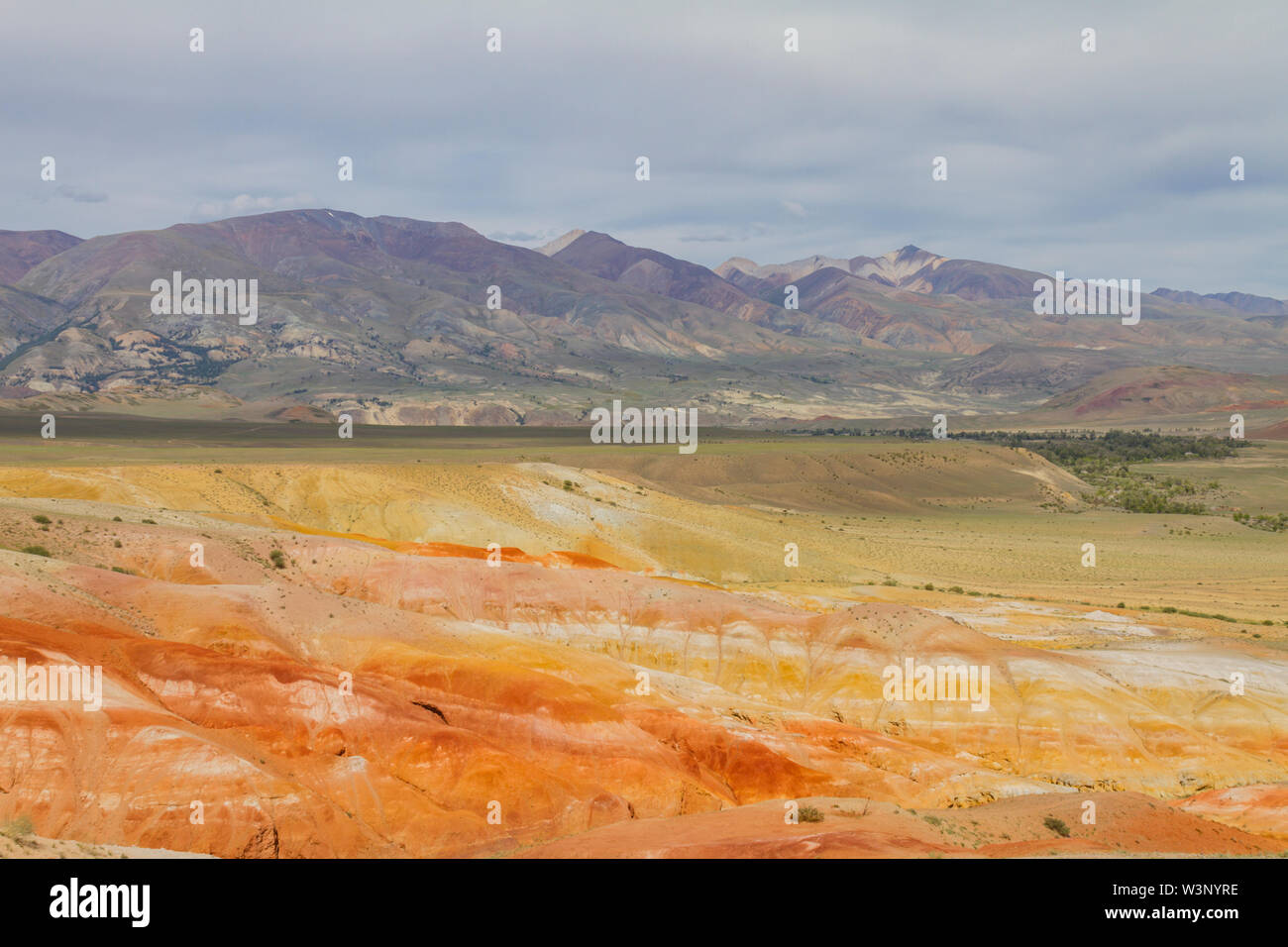 Red mountains in Kyzyl-Chin valley in Altay. Scenic landscape. Summer time. Stock Photo