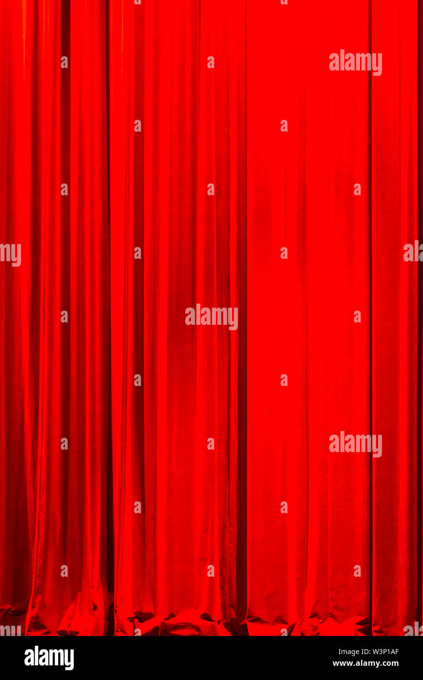 Front View Of A Closed Vintage Style Red Velvet Theater Curtain