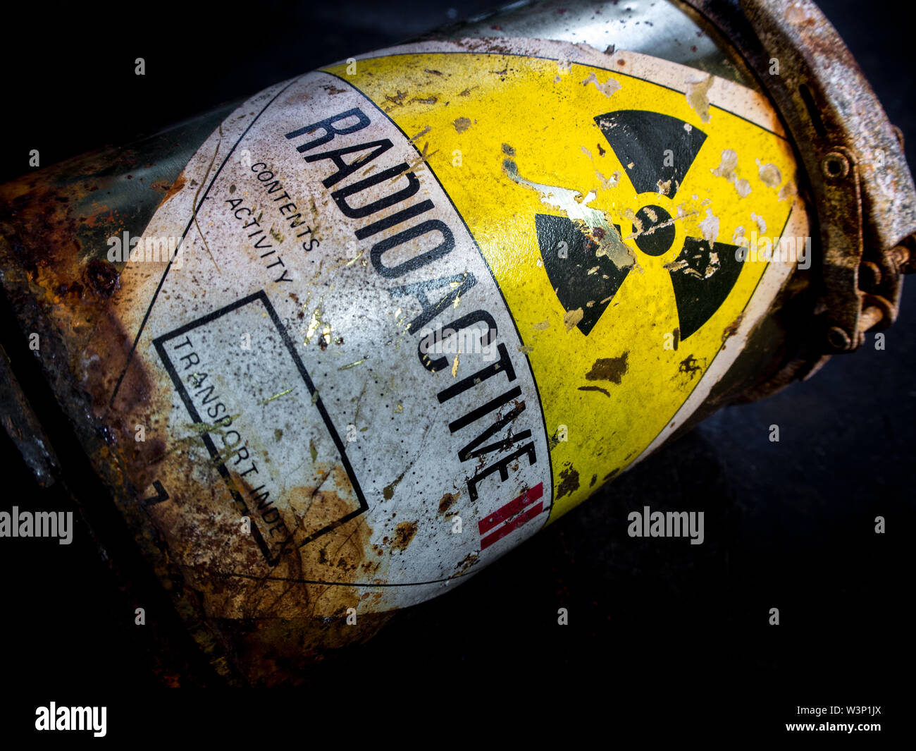 Radiation warning sign on transport index label stick on the rust and