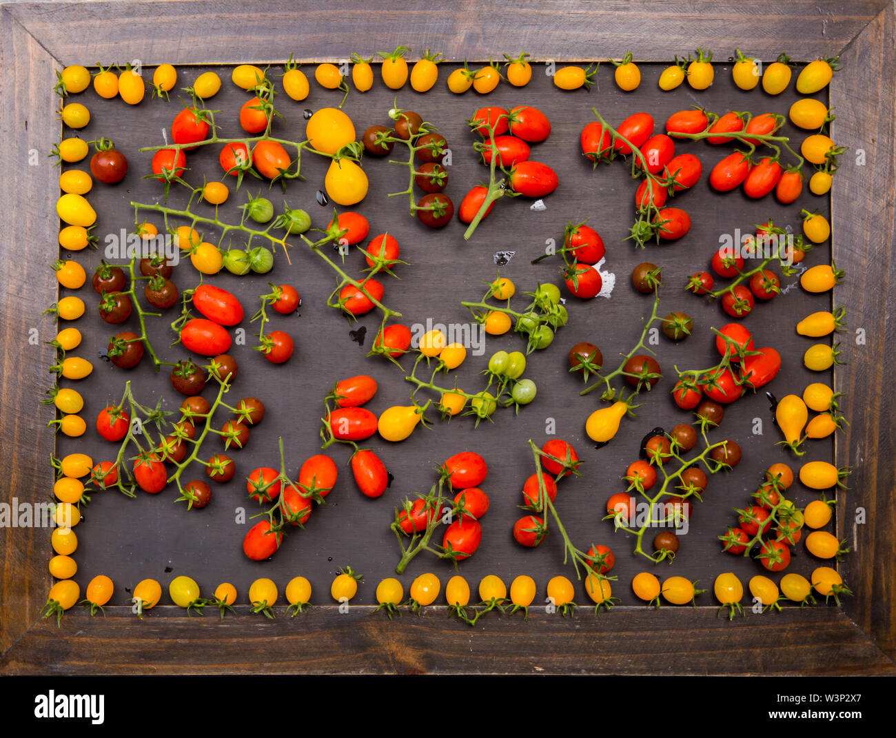 frame of red and yellow tomatoes Stock Photo - Alamy