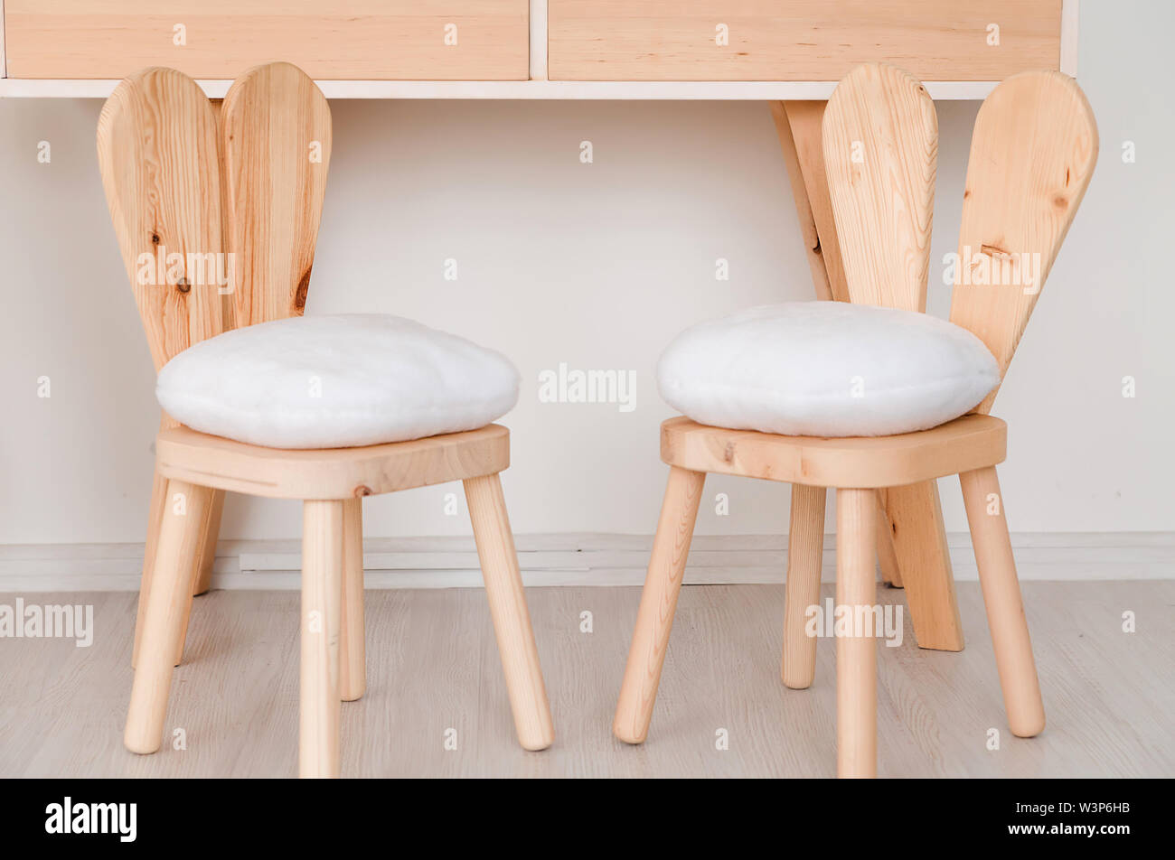 2 chairs with bunny ears in the nursery Stock Photo