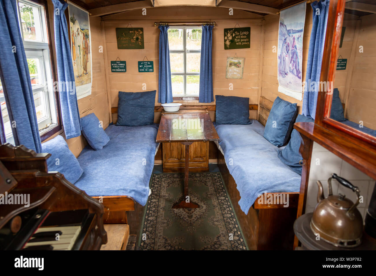 Interior view of a horse drawn wagon type caravan, UK Stock Photo