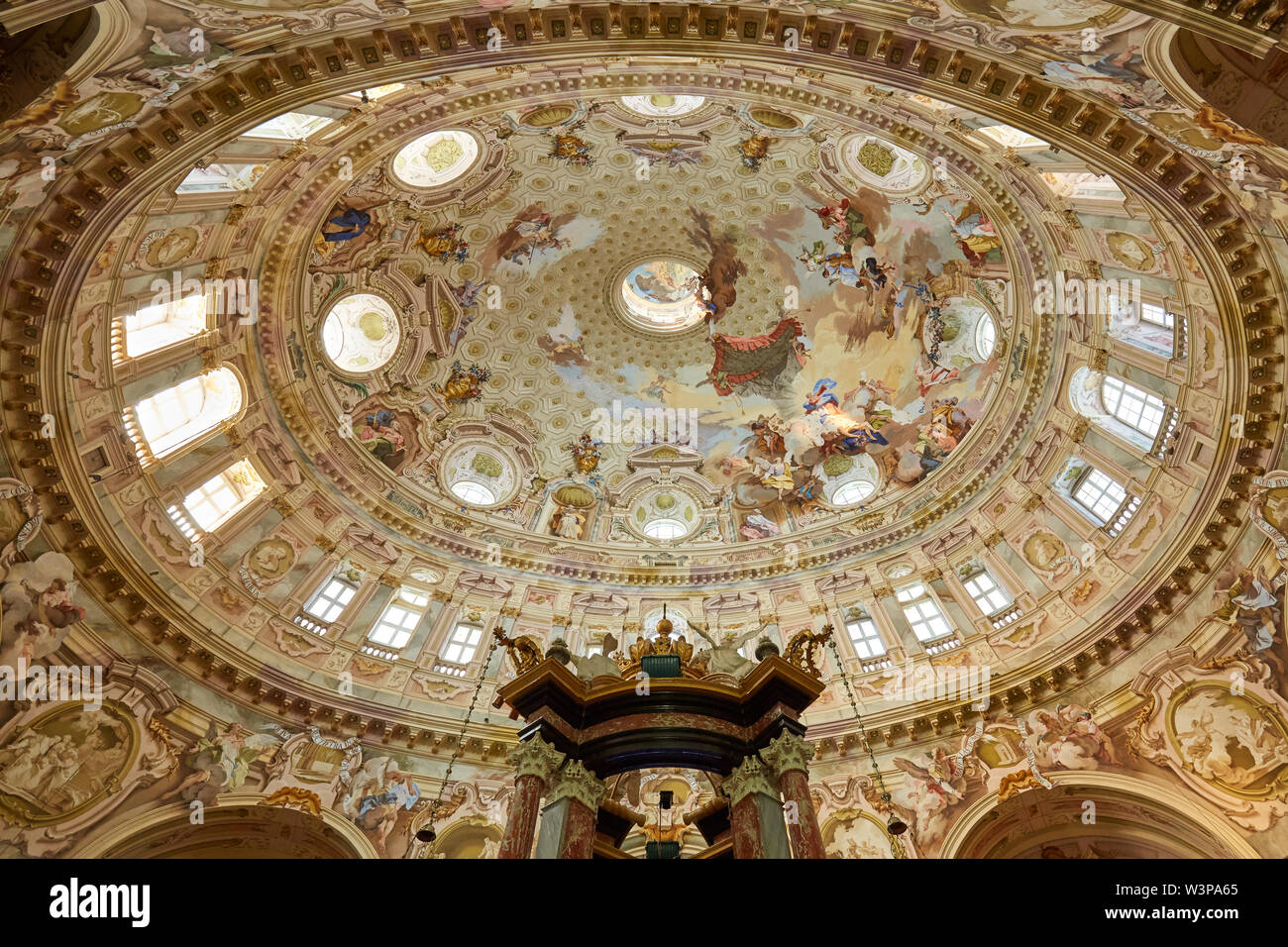 Vicoforte, Italy - August 17, 2016: Sanctuary of Vicoforte elliptical baroque dome with frescos, wide angle view in Piedmont, Italy Stock Photo