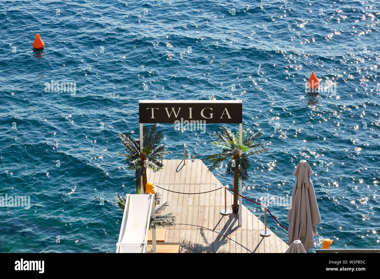 MONTE CARLO, MONACO - AUGUST 21, 2016: Twiga lounge and shisha bar terrace on the sea in a sunny summer day in Monte Carlo, Monaco. Stock Photo