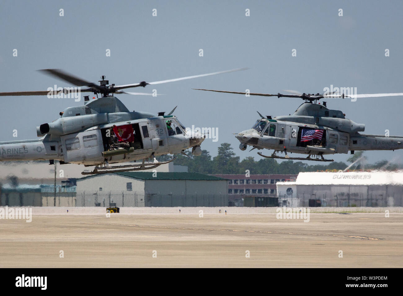 U.S. Marine Corps UH-1Y Hueys assigned to Marine Medium Tiltrotor Squadron (VMM) 264 prepare for landing during a homecoming reception at Marine Corps Air Station New River, North Carolina, July 14, 2019. Marines and Sailors with VMM-264 returned from a deployment with the 22nd Marine Expeditionary Unit. (U.S. Marine Corps photo by Cpl. Cody Rowe) Stock Photo