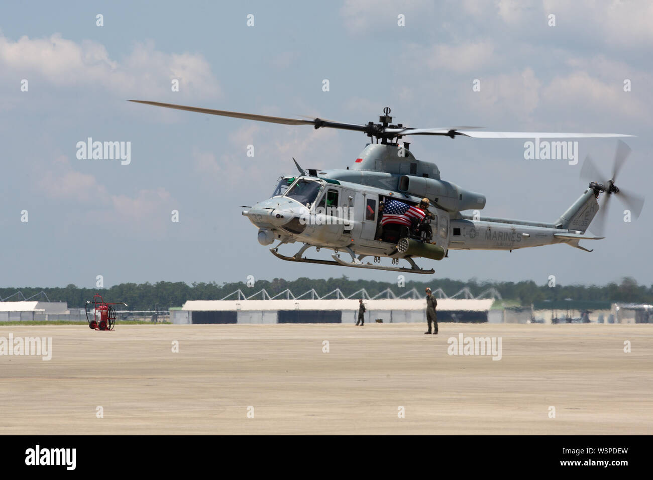 A U.S. Marine Corps UH-1Y Huey assigned to Marine Medium Tiltrotor Squadron (VMM) 264 prepare for landing during a homecoming reception at Marine Corps Air Station New River, North Carolina, July 14, 2019. Marines with VMM-264 returned from a deployment with the 22nd Marine Expeditionary Unit. (U.S. Marine Corps photo by Cpl. Cody Rowe) Stock Photo