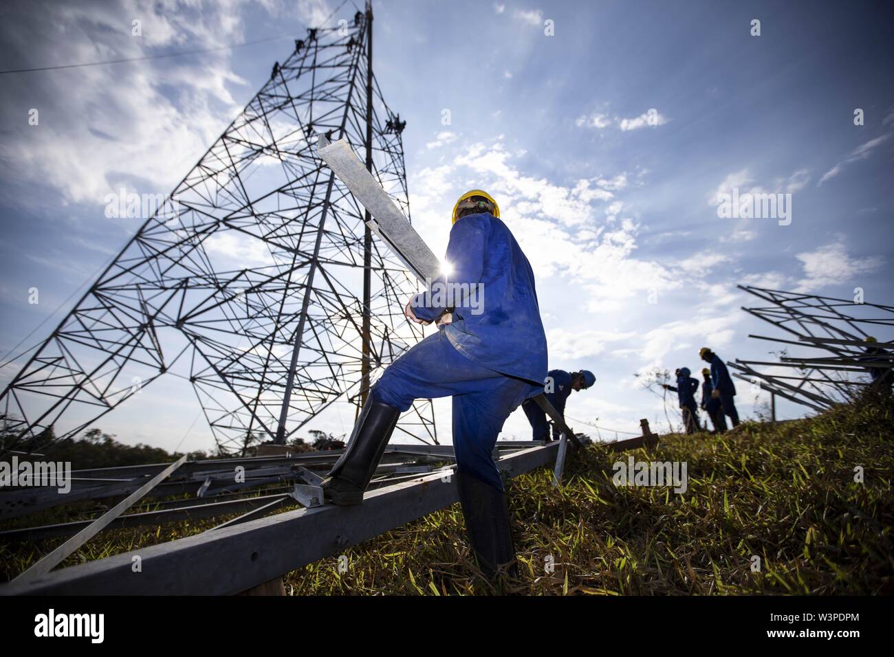 Beijing, China. 7th Aug, 2018. Workers are seen at a site for the ultra-high-voltage electricity transmission project at the Belo Monte hydroelectric dam in Brazil, Aug. 7, 2018. Credit: Li Ming/Xinhua/Alamy Live News Stock Photo