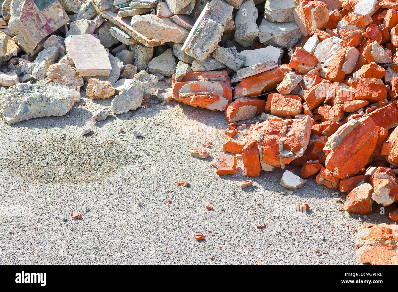 Concrete and brick rubble debris on construction site after a ...