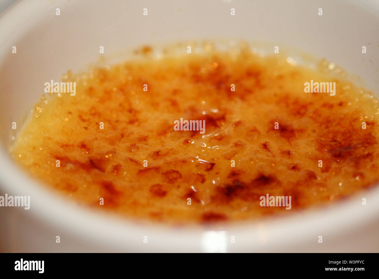 Caramelized sugar surface of creme brulee Stock Photo Alamy