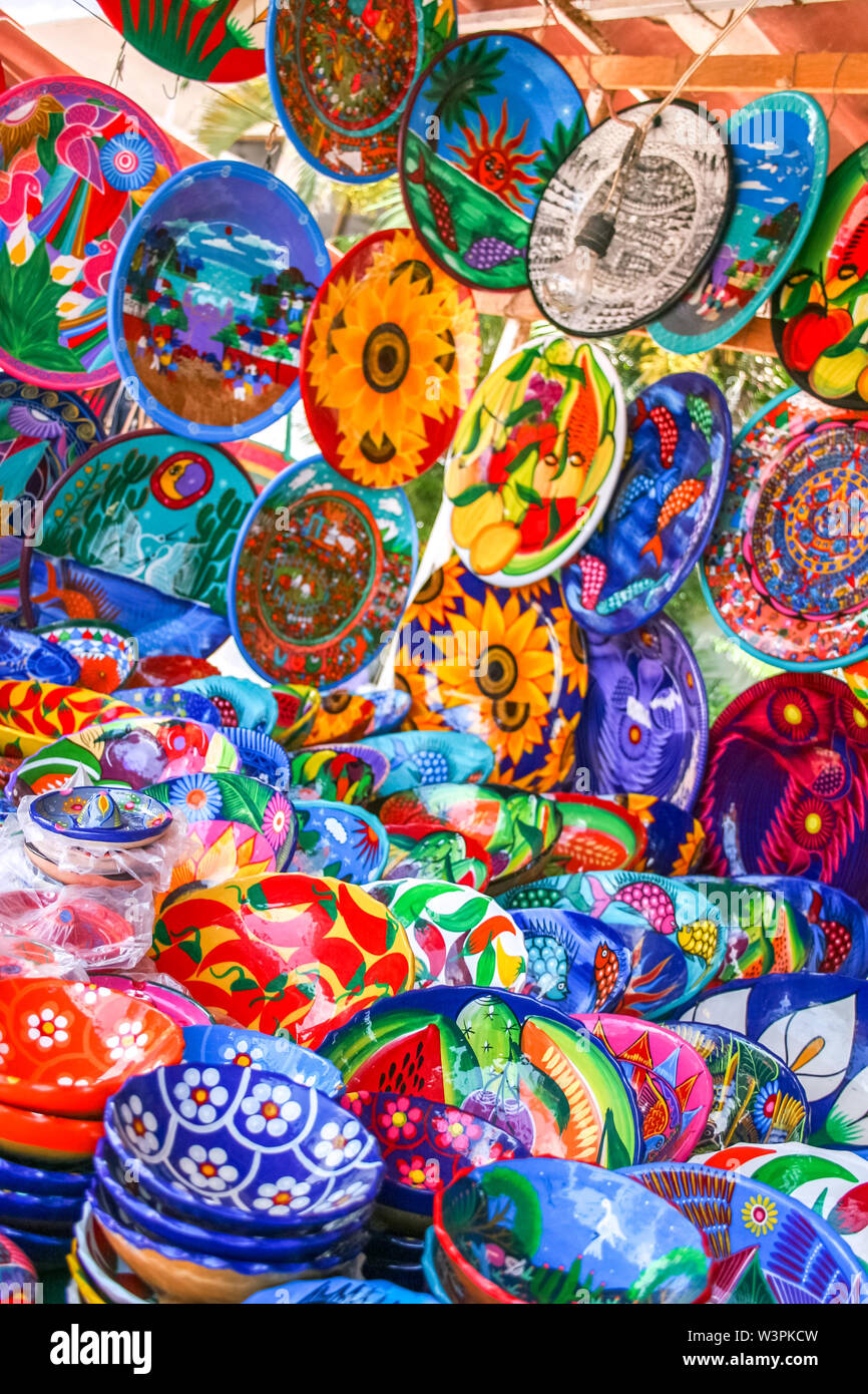 Colorful handmade decorative mexican plates with many patterns on the