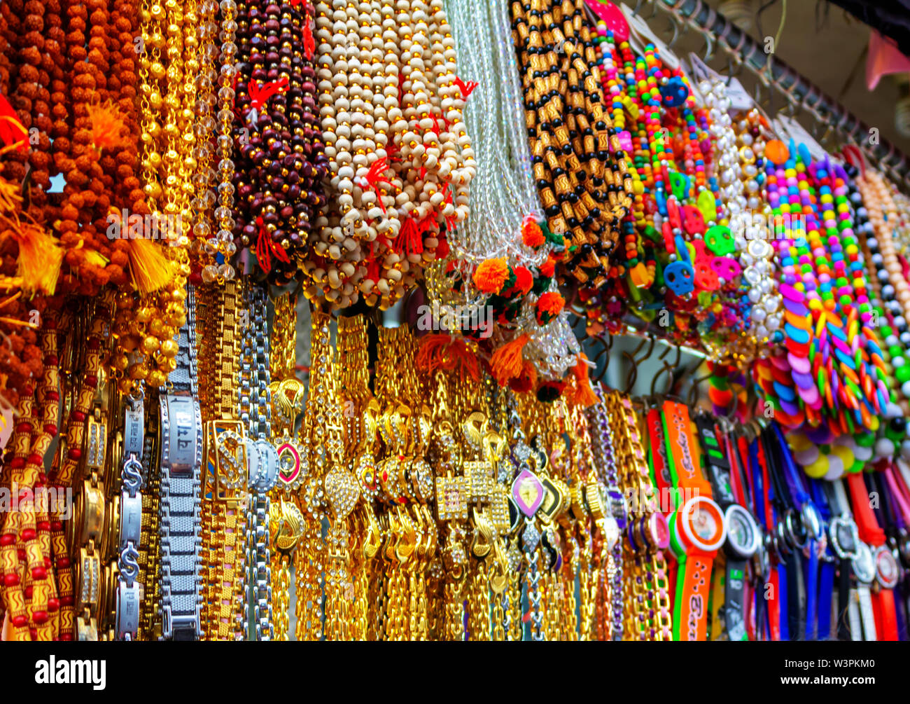 Prayers beads, gift from India. Colorful ethnic wooden beads necklace.street market in katra, Jammu India Stock Photo