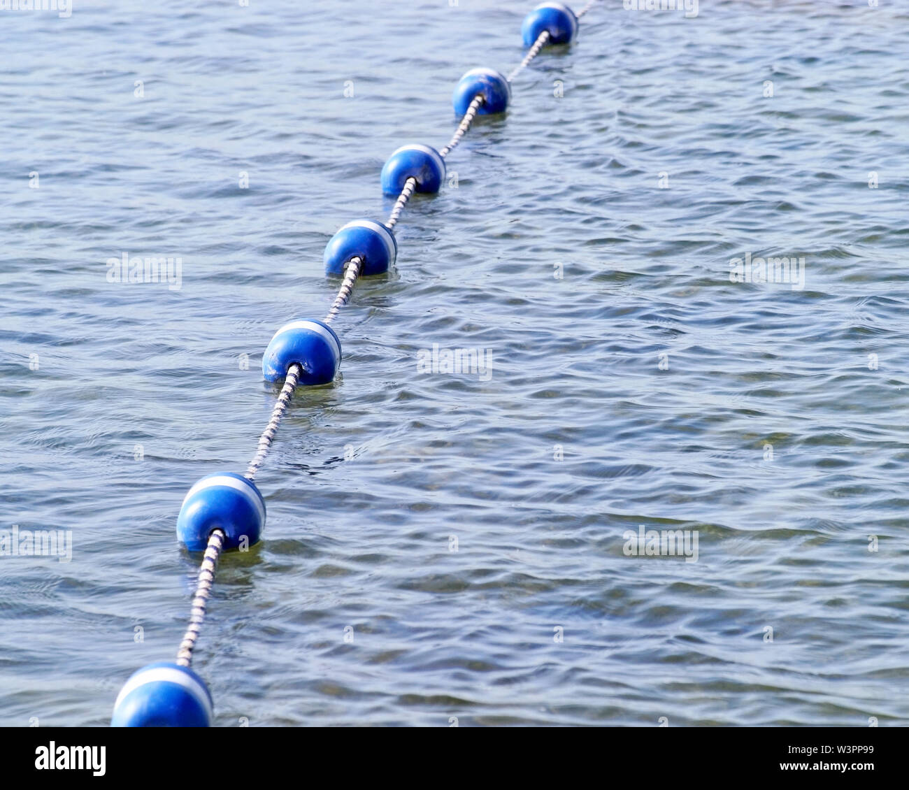 Swimming area marker buoys hi-res stock photography and images - Alamy