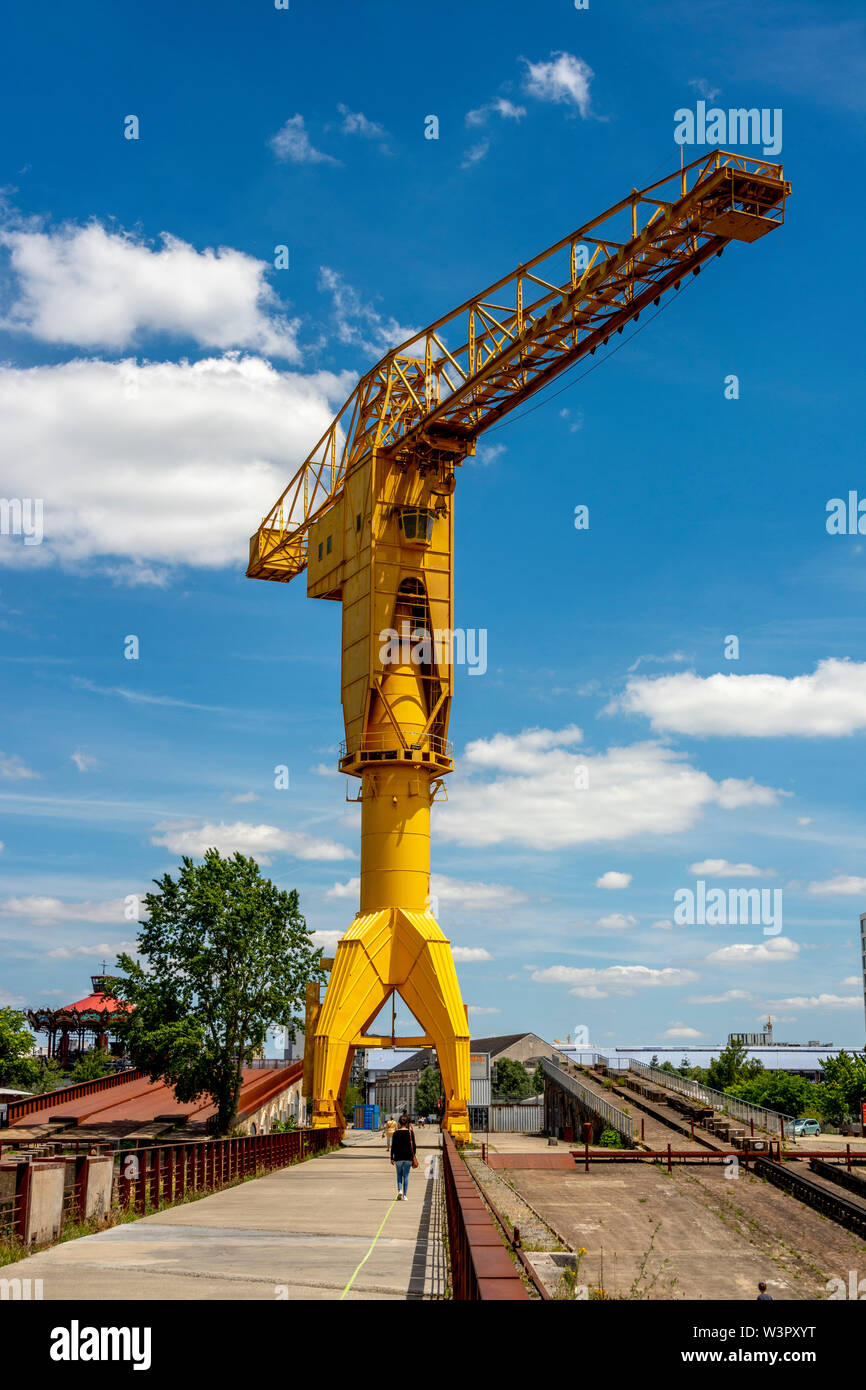 Yellow crane, Cité des Chantiers, ile de Nantes, Loire Atlantique department, Pays de la Loire, France Stock Photo