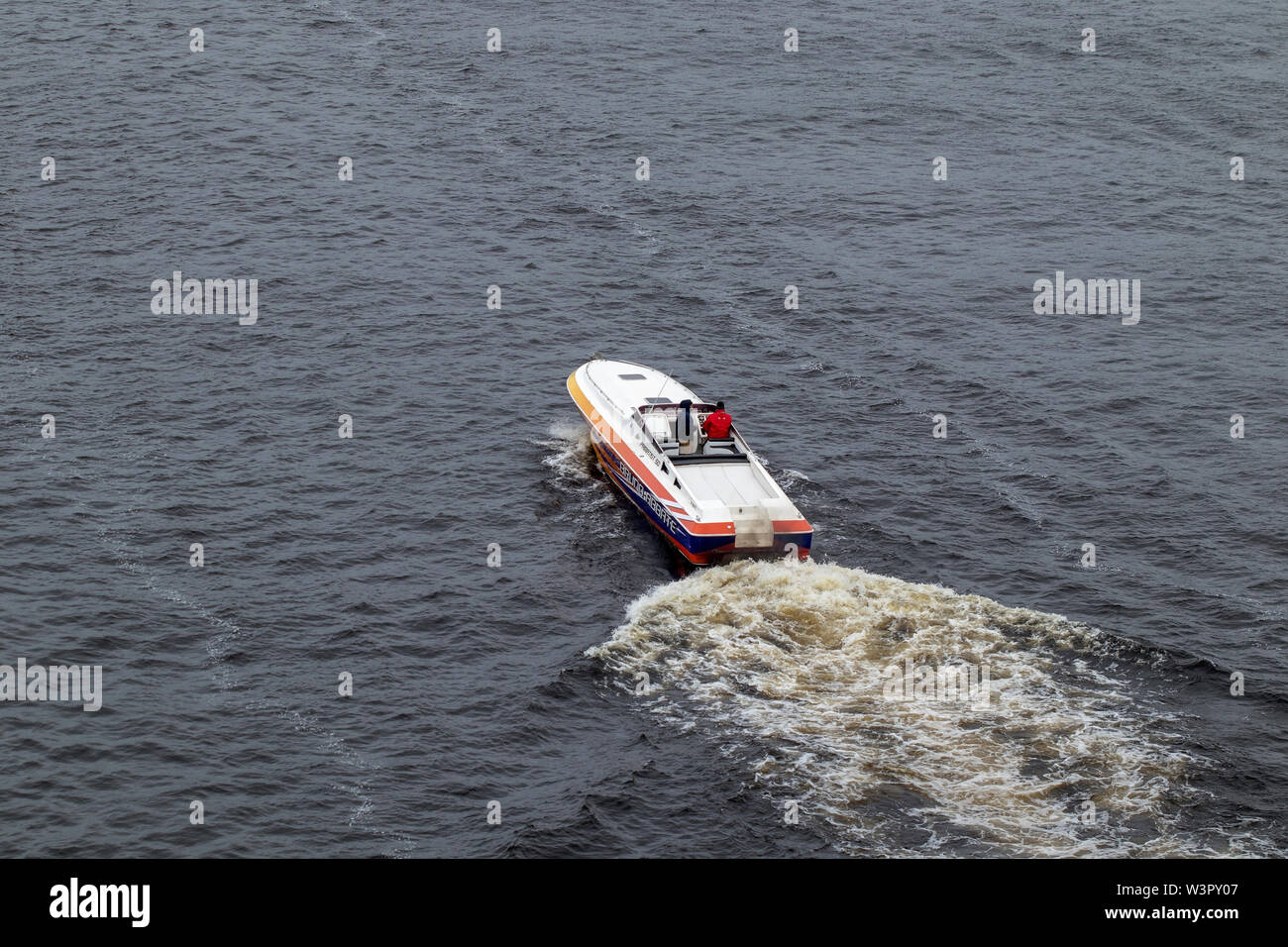 Small speed boat speeding along lake Saimaa, Lappeenranta Finland Stock ...