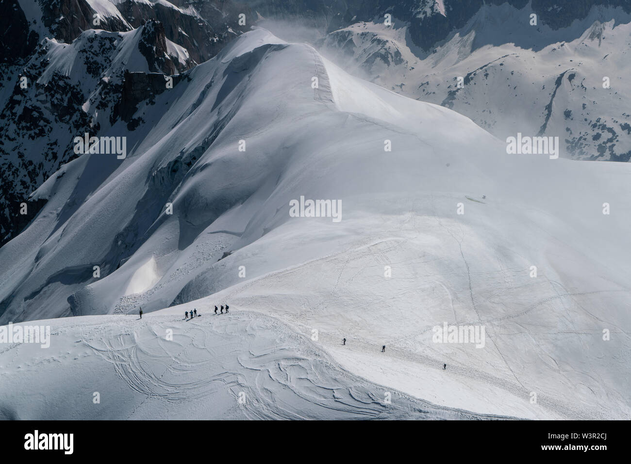 Mountaineers on a glacier in the French Alps in summer Stock Photo