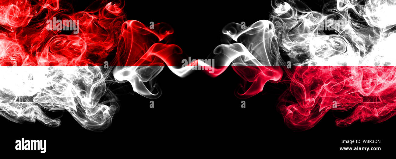Indonesia vs Poland, Polish smoky mystic flags placed side by side. Thick colored silky smoke